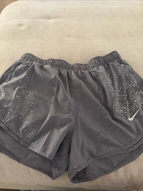Nike Women's Charcoal Gray Athletic Shorts with Reflective Dot Accents
